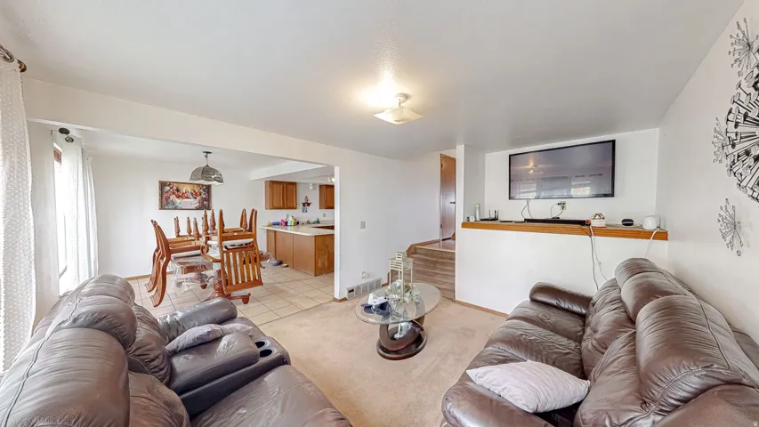 Living area with carpeted flooring