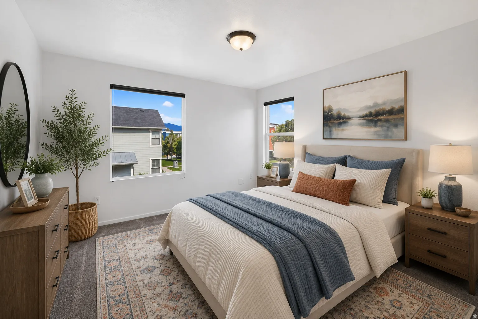 Virtually staged bright bedroom featuring a ceiling light and two large windows