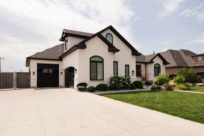 White brick facade with dark trim accents