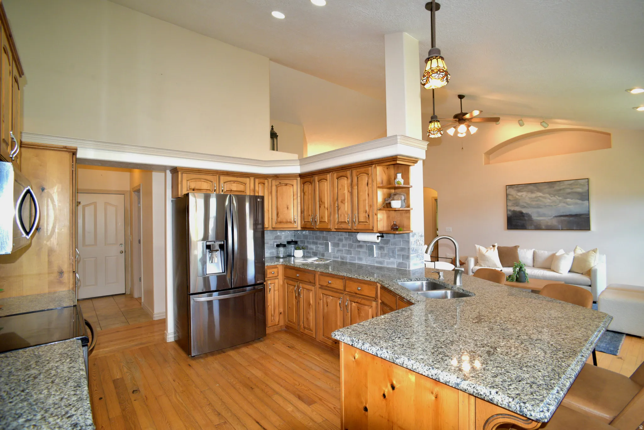 KITCHEN AND DINING WITH HARDWOOD FLOORS