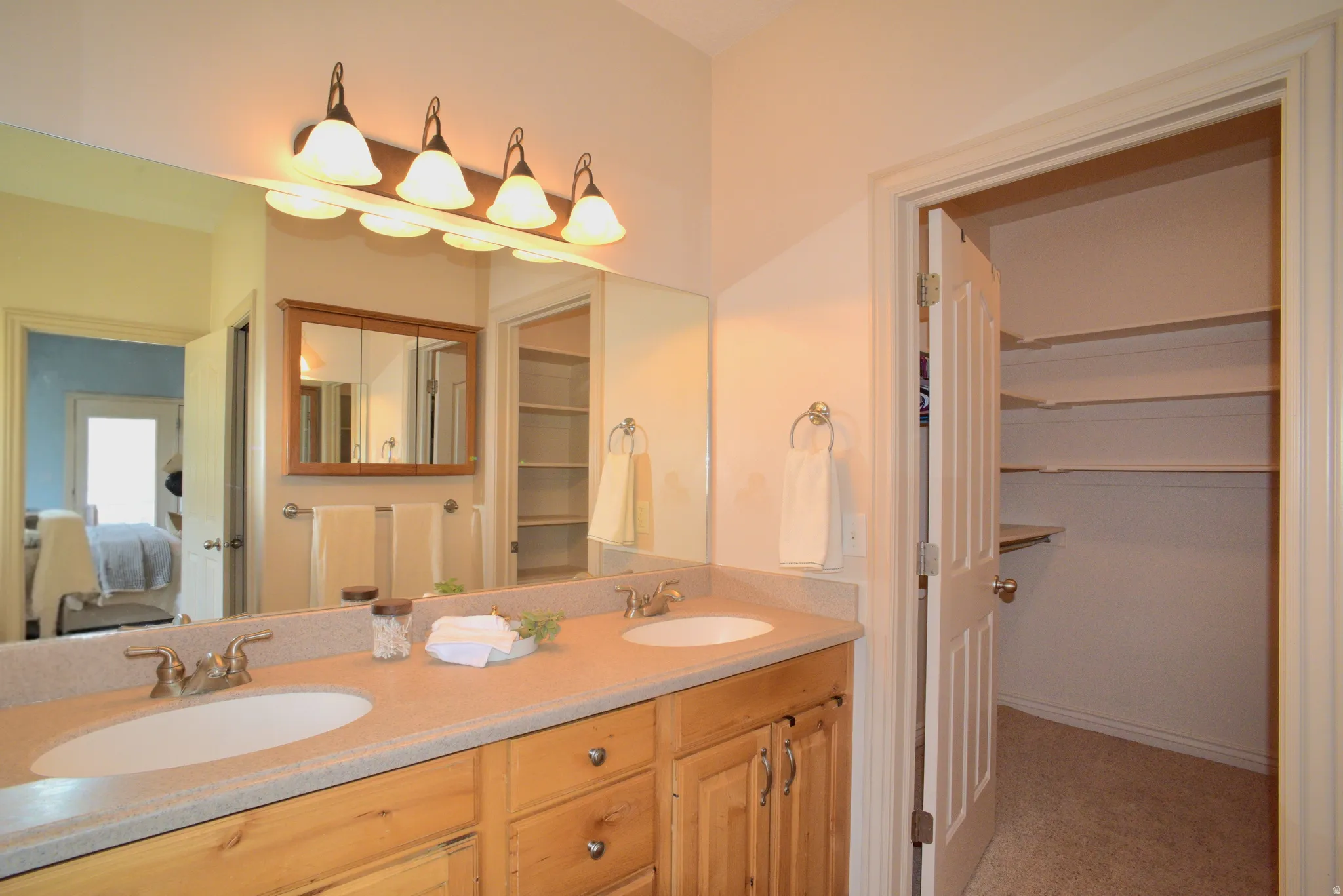 DOUBLE SINKS PROVIDE LARGE VANITY