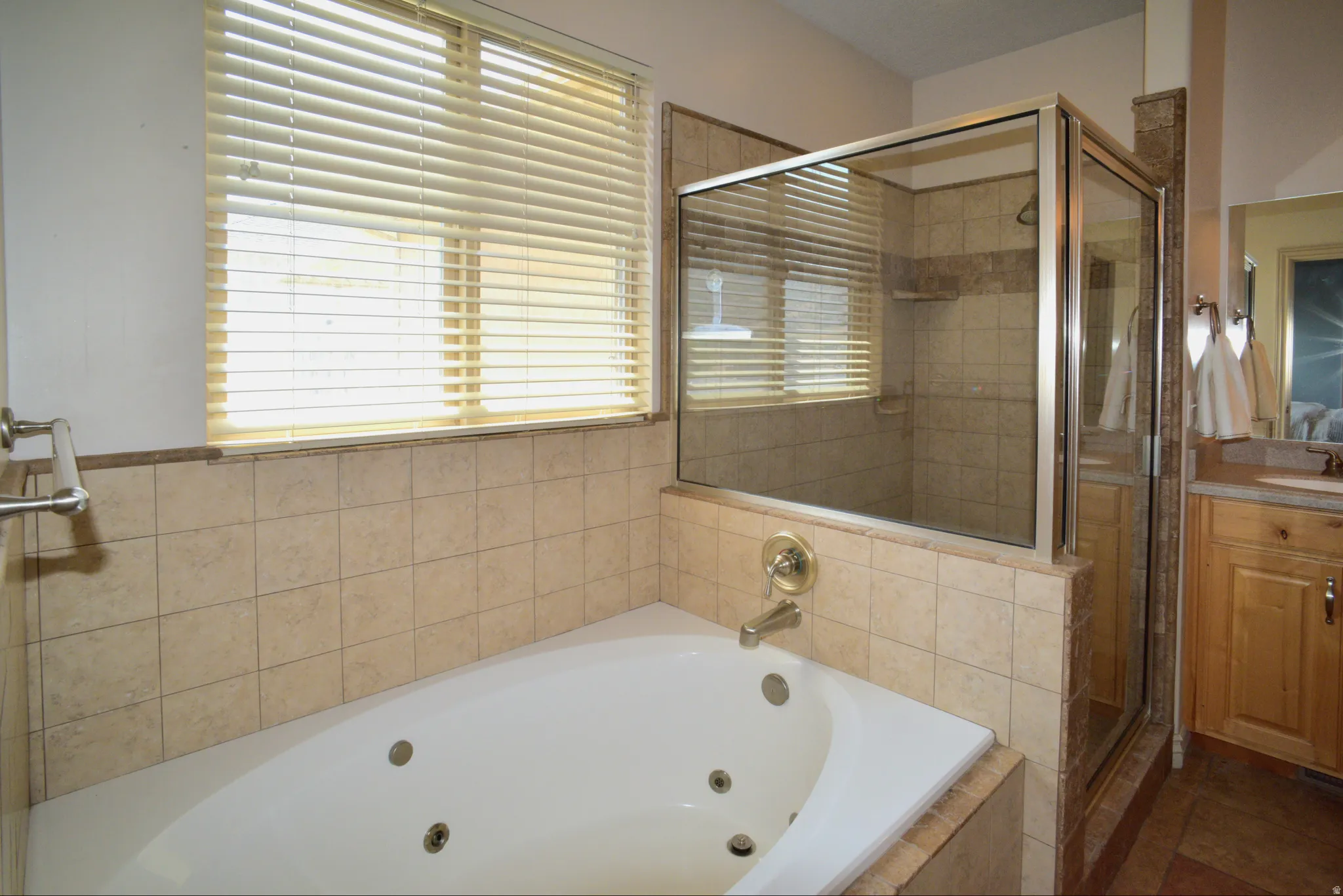 PRIMARY ENSUITE BATH WITH  JETTED TUB AND SEPARATE SHOWER