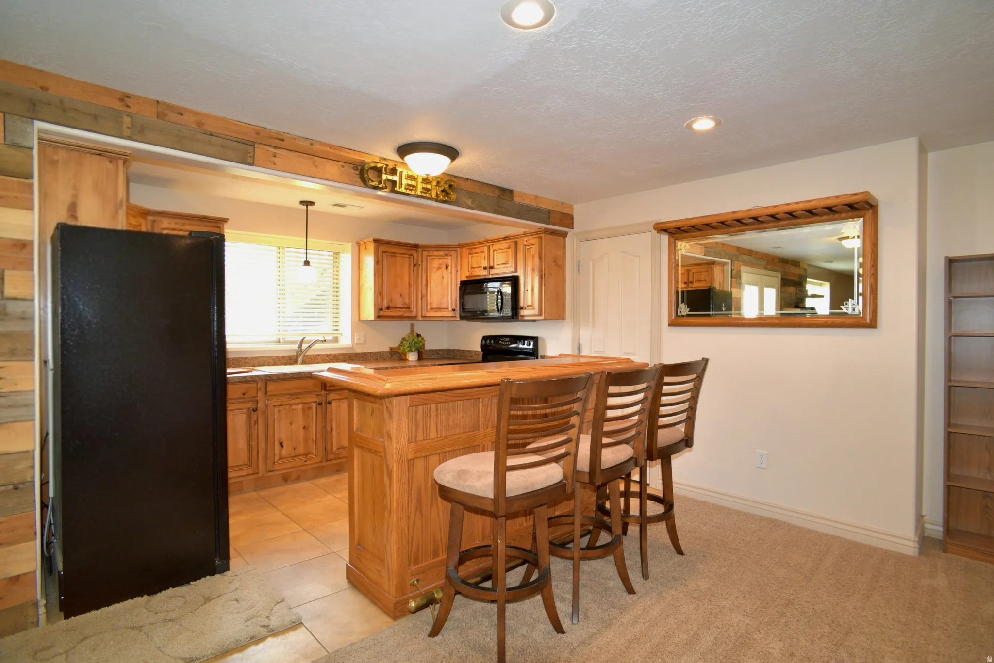 FULL KITCHEN DOWN CREATES VERY NICE MIL APARTMENT