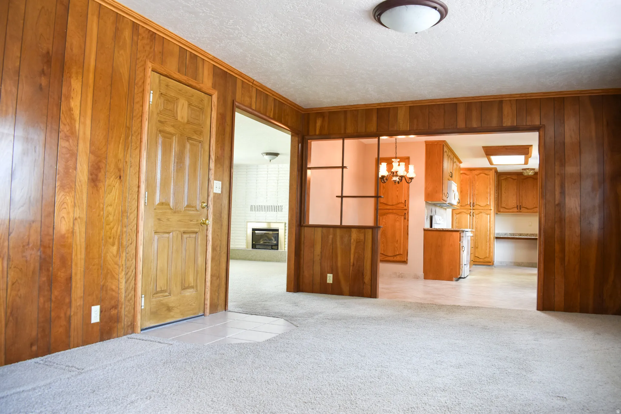Wood paneling and trim throughout the main living space