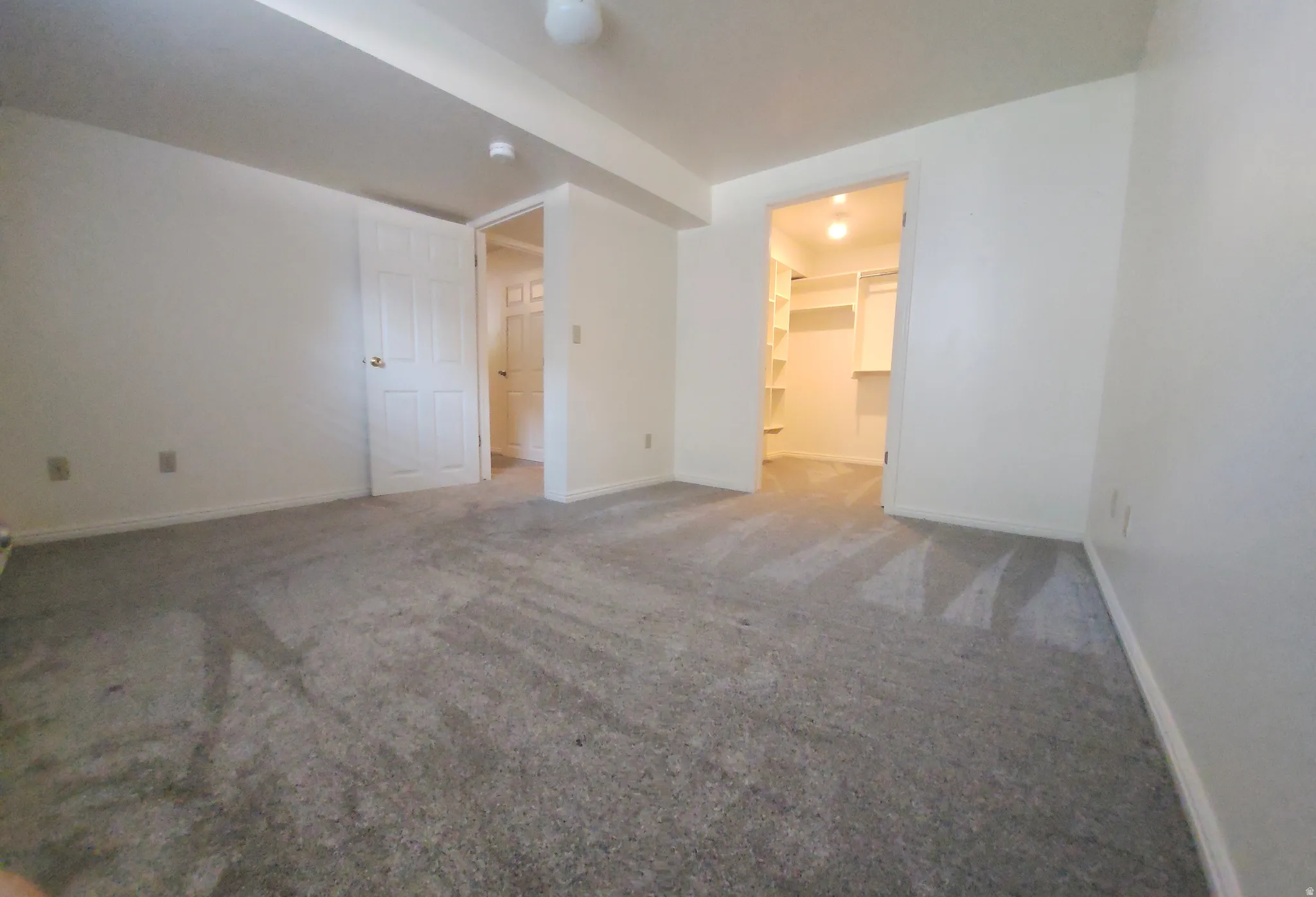 4th Bedroom with spacious closet with neutral wall finishes, recessed ceiling lighting, and direct access to an ensuite bathroom