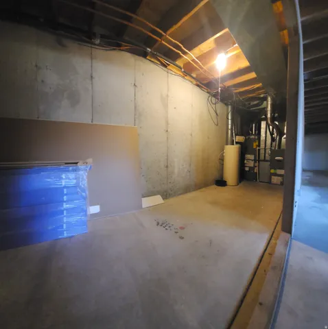 Concrete flooring with exposed ceiling joists and support beams