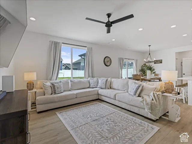 Bright living area with light wood-finish flooring