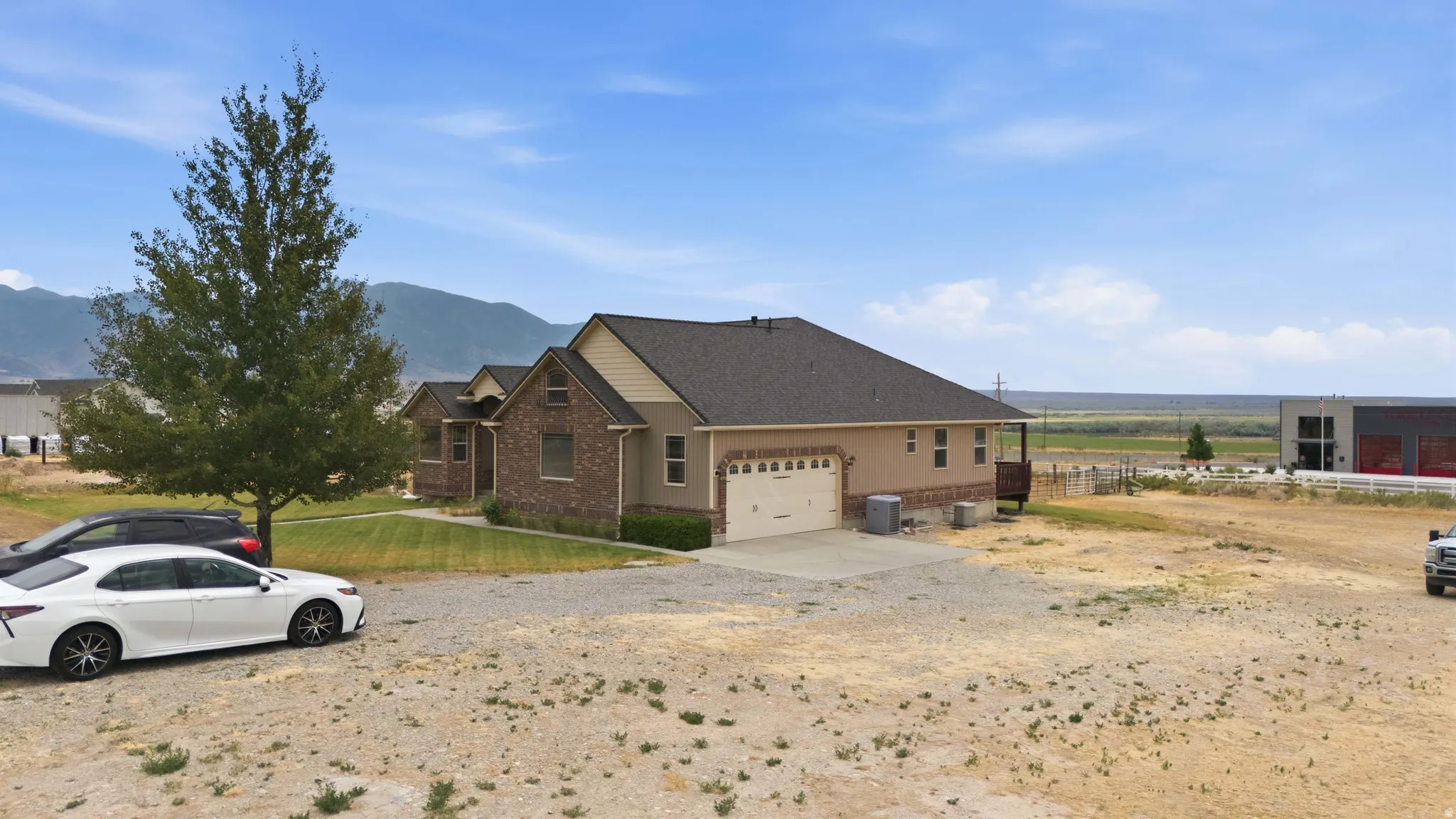 Two-story residence featuring brick and siding exterior construction