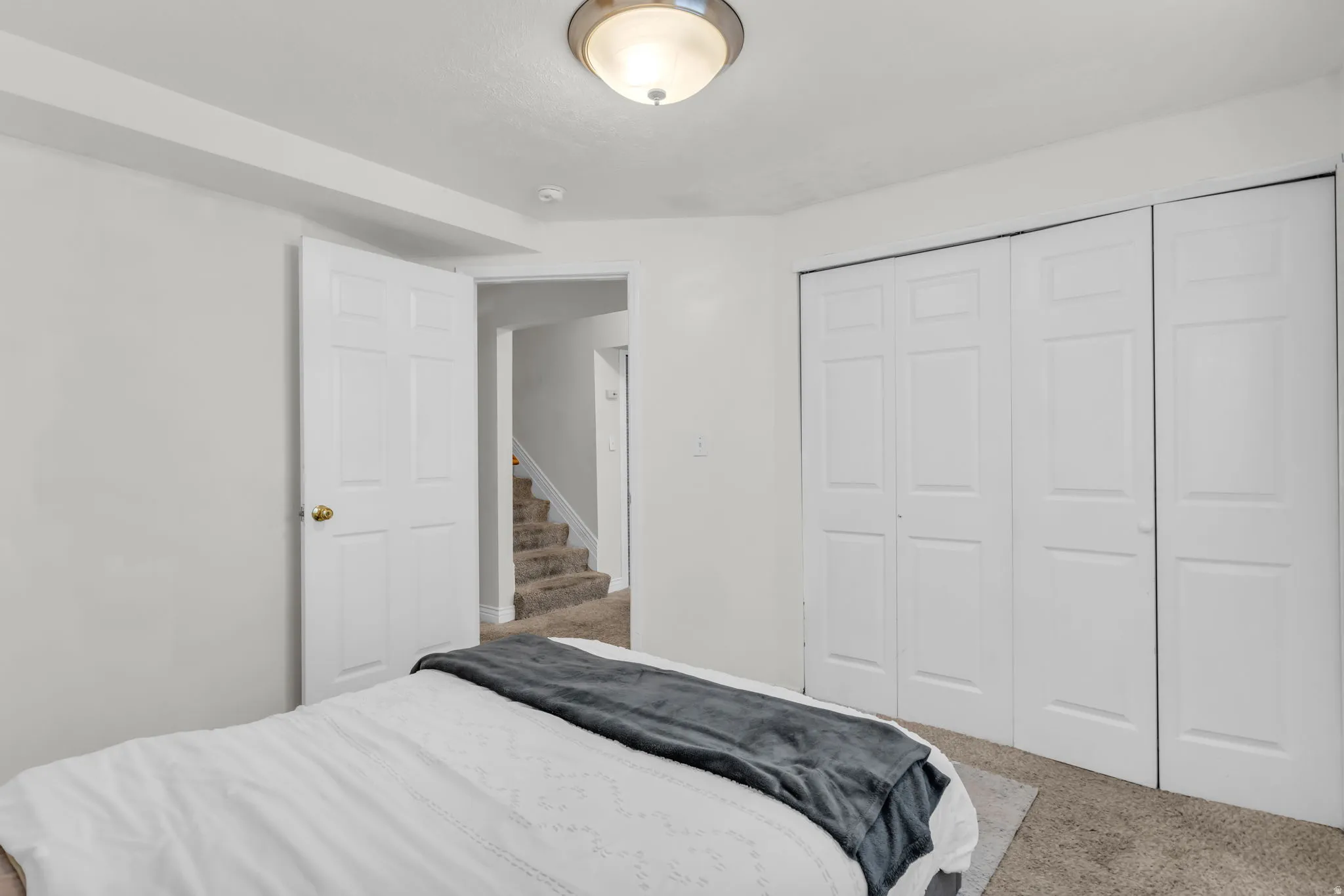 Room featuring neutral wall finishes and wall-to-wall carpeting