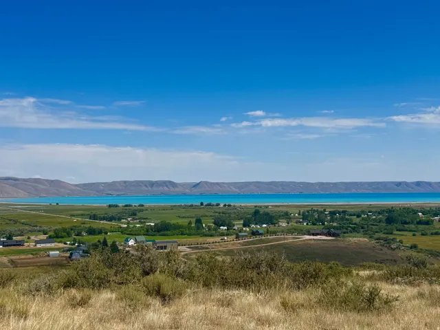 Expansive lake and mountain scenery from an elevated perspective