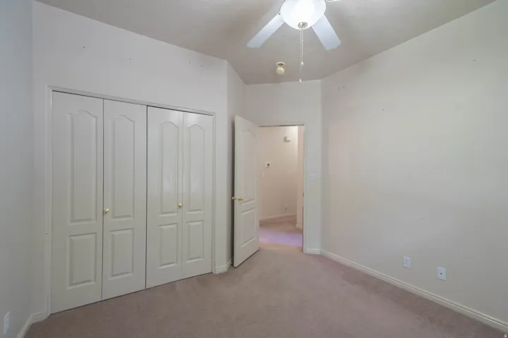 Neutral tone wall paint with baseboard trim