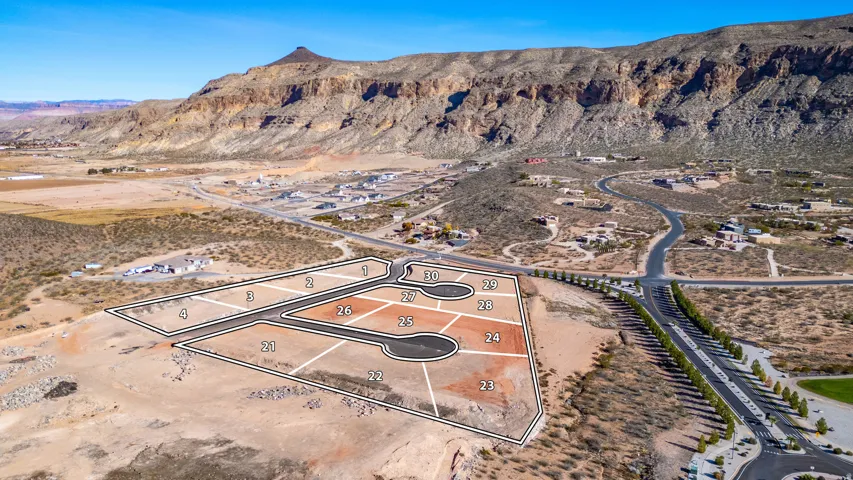 Aerial perspective showcasing a new residential development with multiple numbered lots