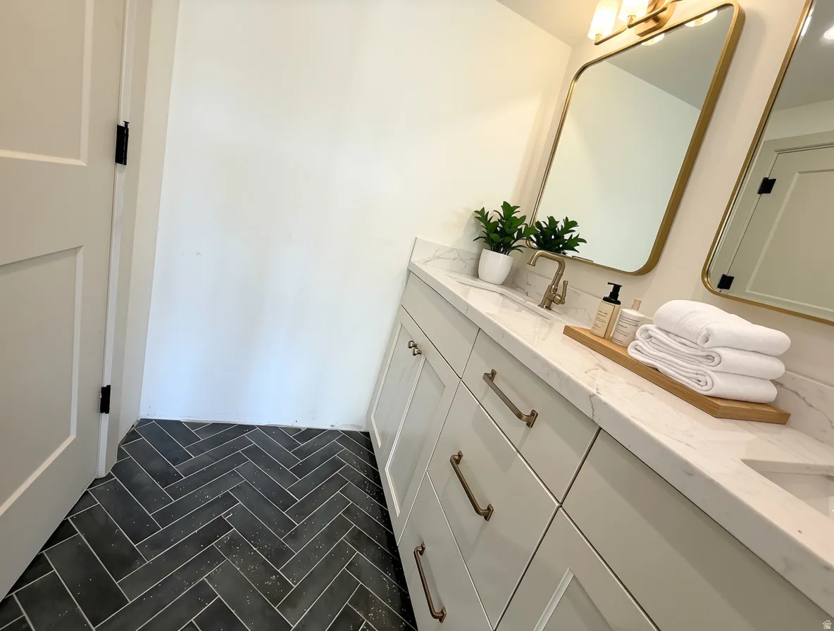 Double vanity with stone countertop and integrated sinks