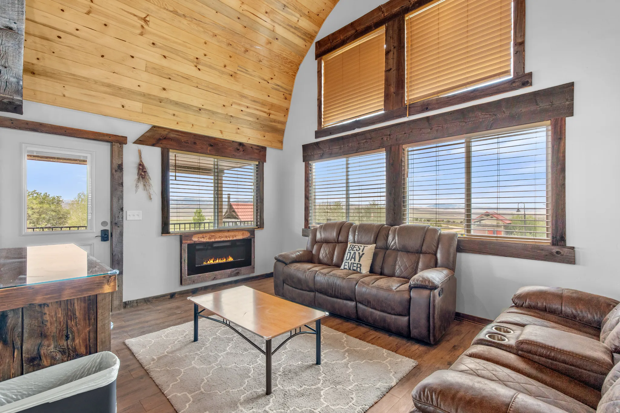 Vaulted wood-paneled ceiling with exposed beams
