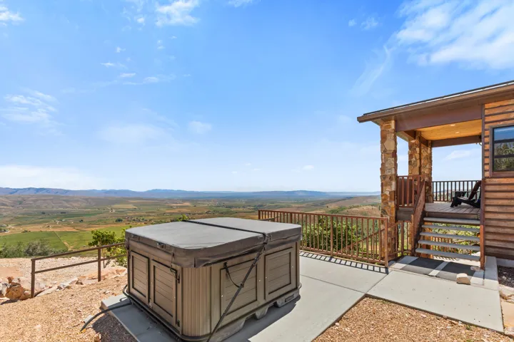 Outdoor spa positioned on a concrete pad