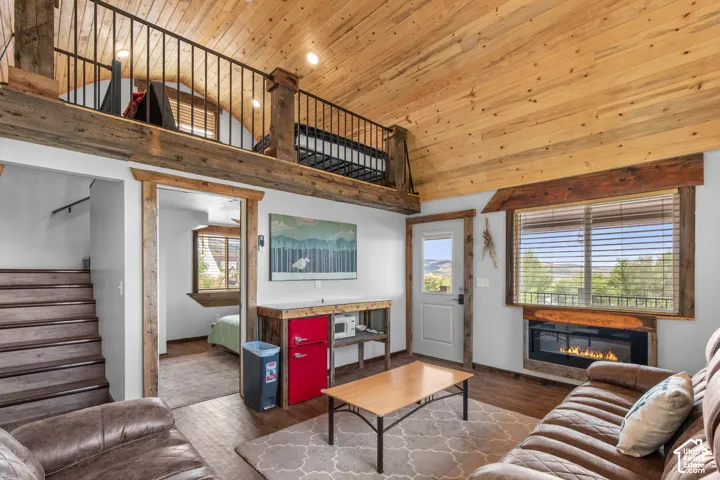 Vaulted wood-finish ceiling with exposed beams