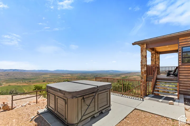 Outdoor spa positioned on a concrete pad