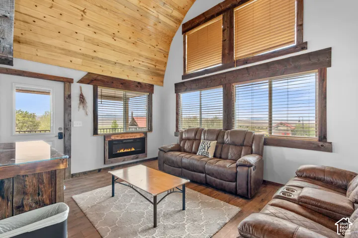 Vaulted wood-paneled ceiling with exposed beams