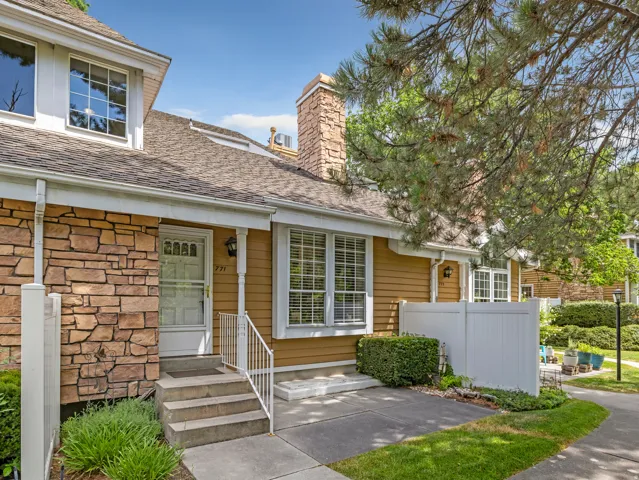 Exterior facade featuring stone veneer and horizontal siding