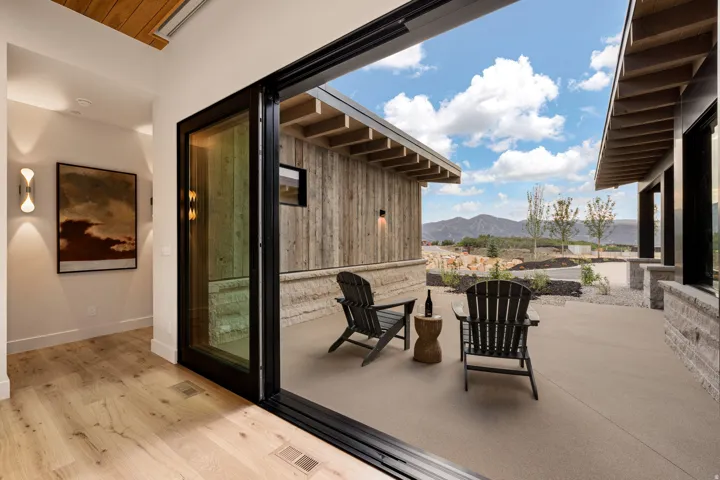Expansive patio space featuring a concrete surface and mountain views