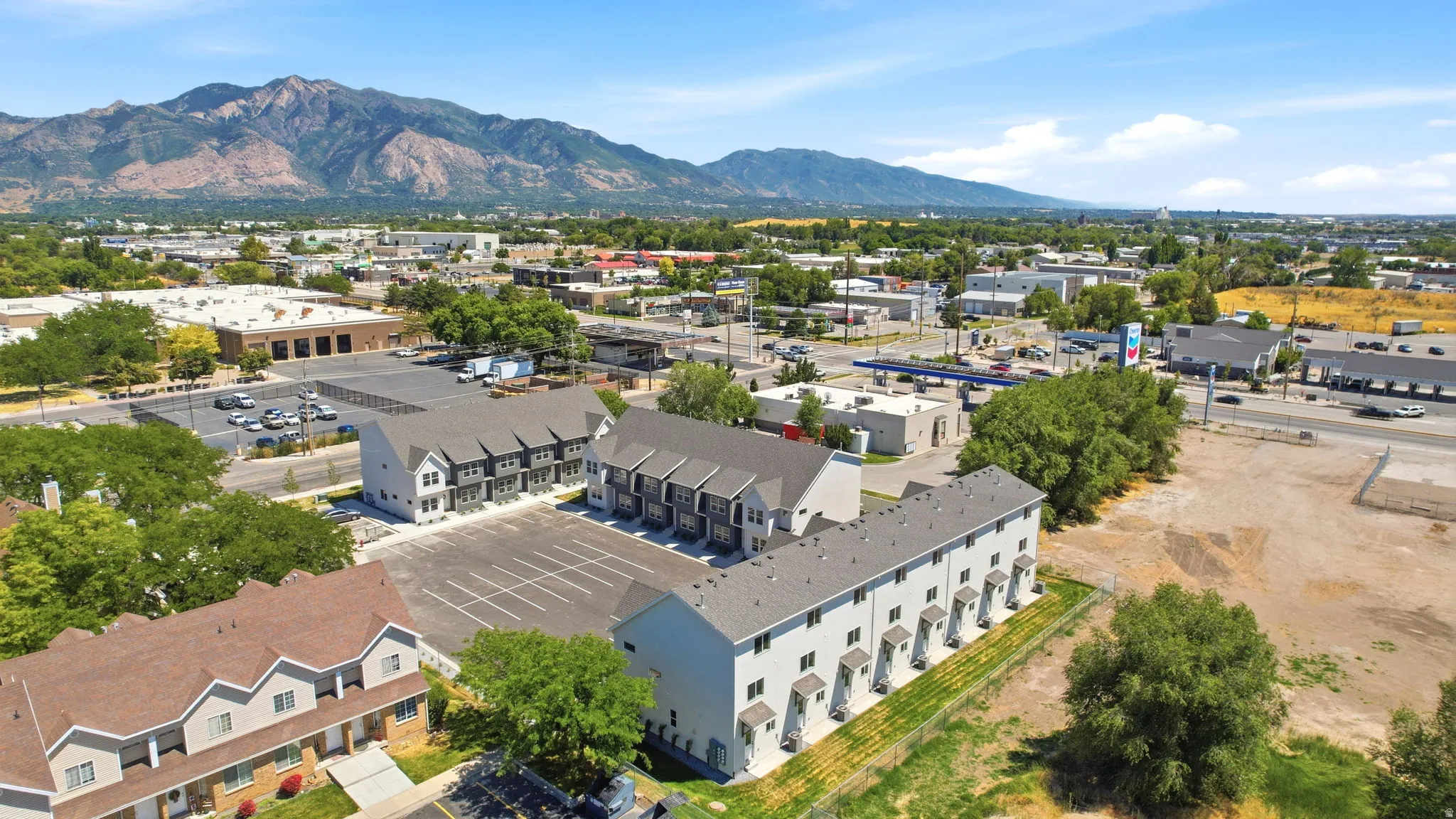Townhome community featuring multi-story units with mountain scenery