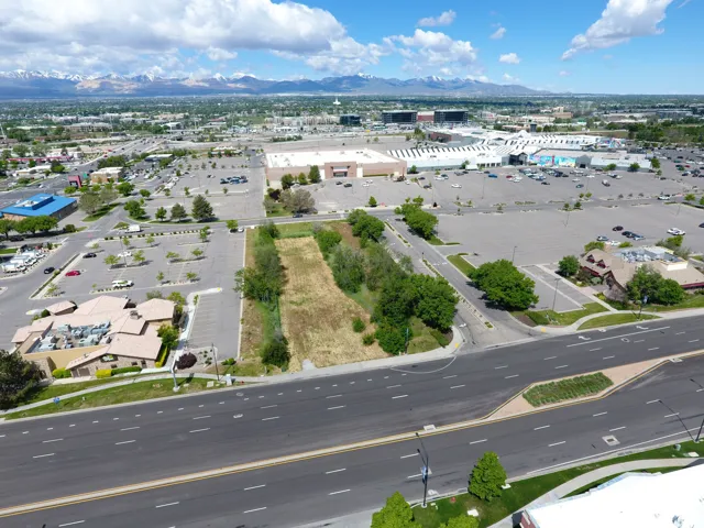 Expansive commercial parcel featuring direct road frontage and proximity to established retail centers