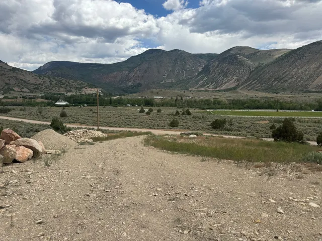 Expansive mountain and valley landscape with varying terrain