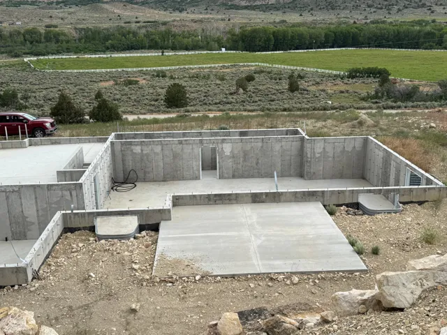 Poured concrete foundation with multiple structural walls