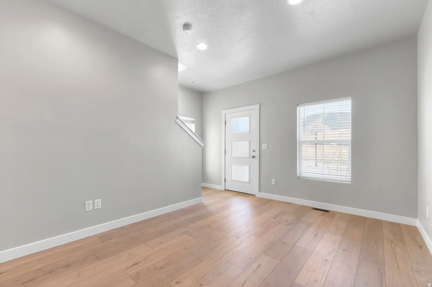 Wood-finish flooring throughout