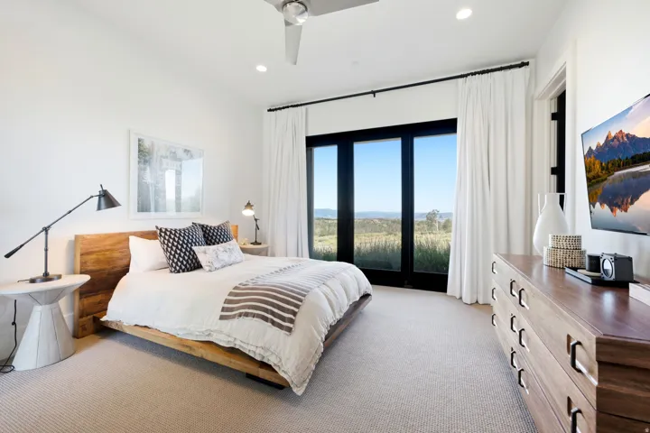 Bedroom featuring wall-to-wall carpeting, recessed lighting, and a ceiling fan