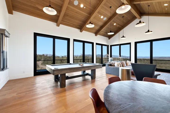 Vaulted wood-plank ceiling with exposed beams
