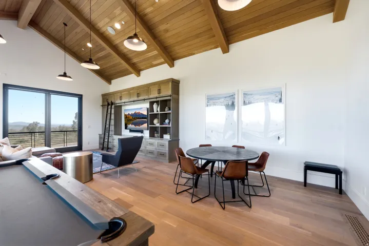 Vaulted wood-paneled ceilings with exposed beams