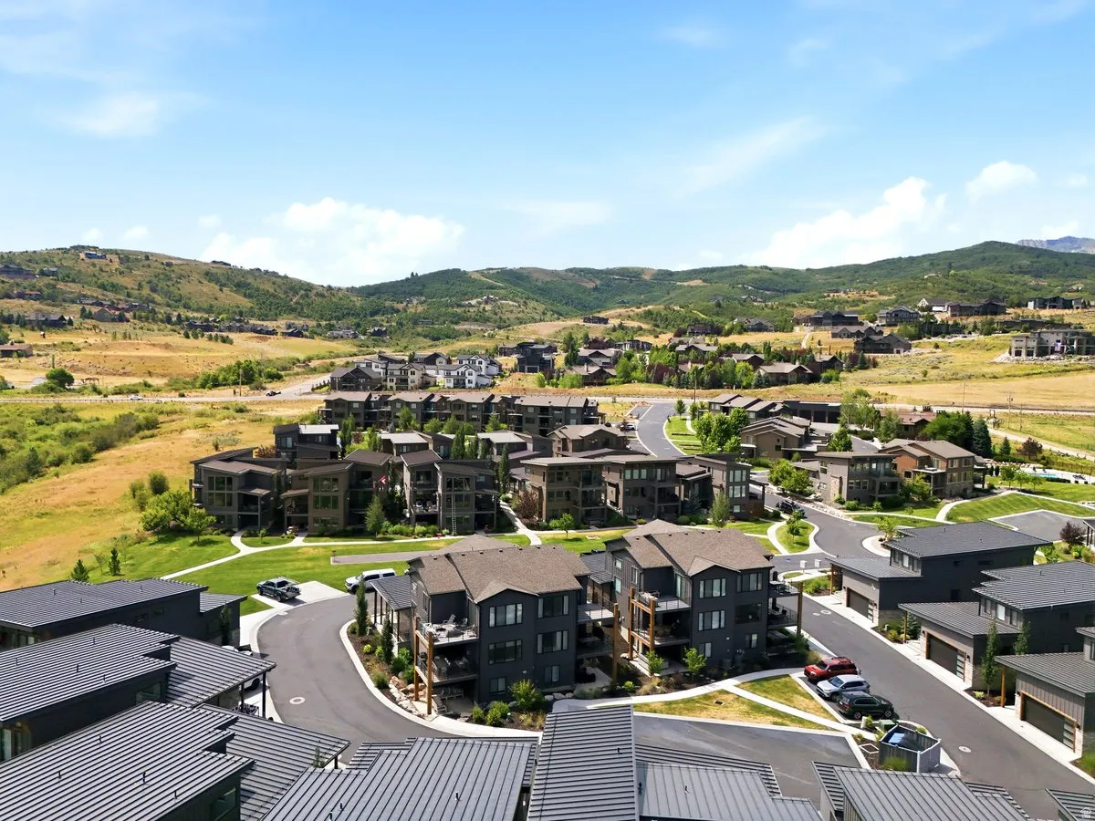 Modern residential development nestled in a natural hillside setting