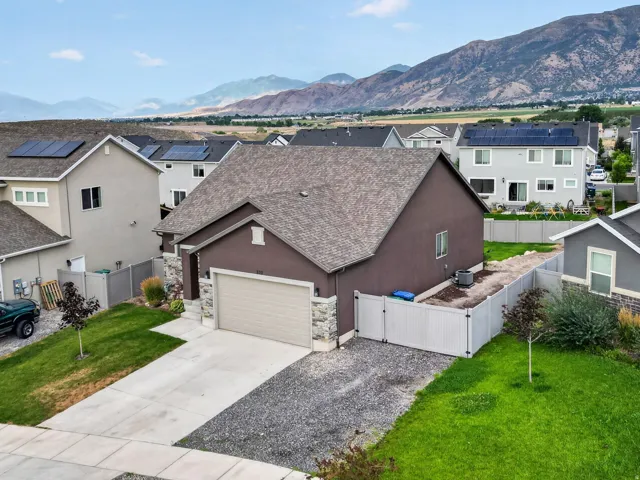 Stucco exterior with an attached two-car garage