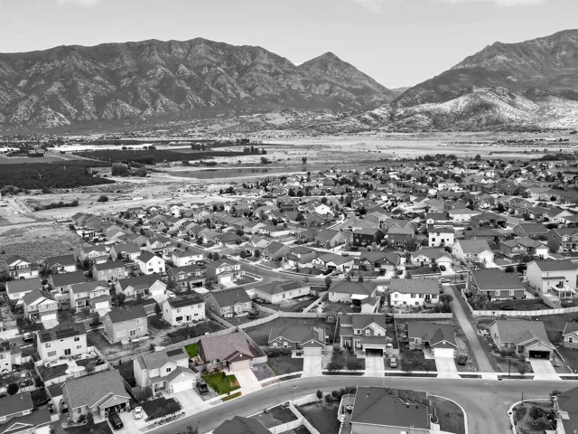 Residential neighborhood set against a mountain backdrop