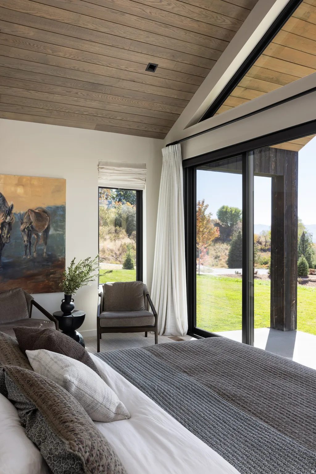 Vaulted wood-finish ceiling with exposed beams