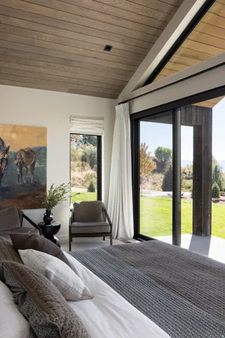 Vaulted wood-finish ceiling with exposed beams