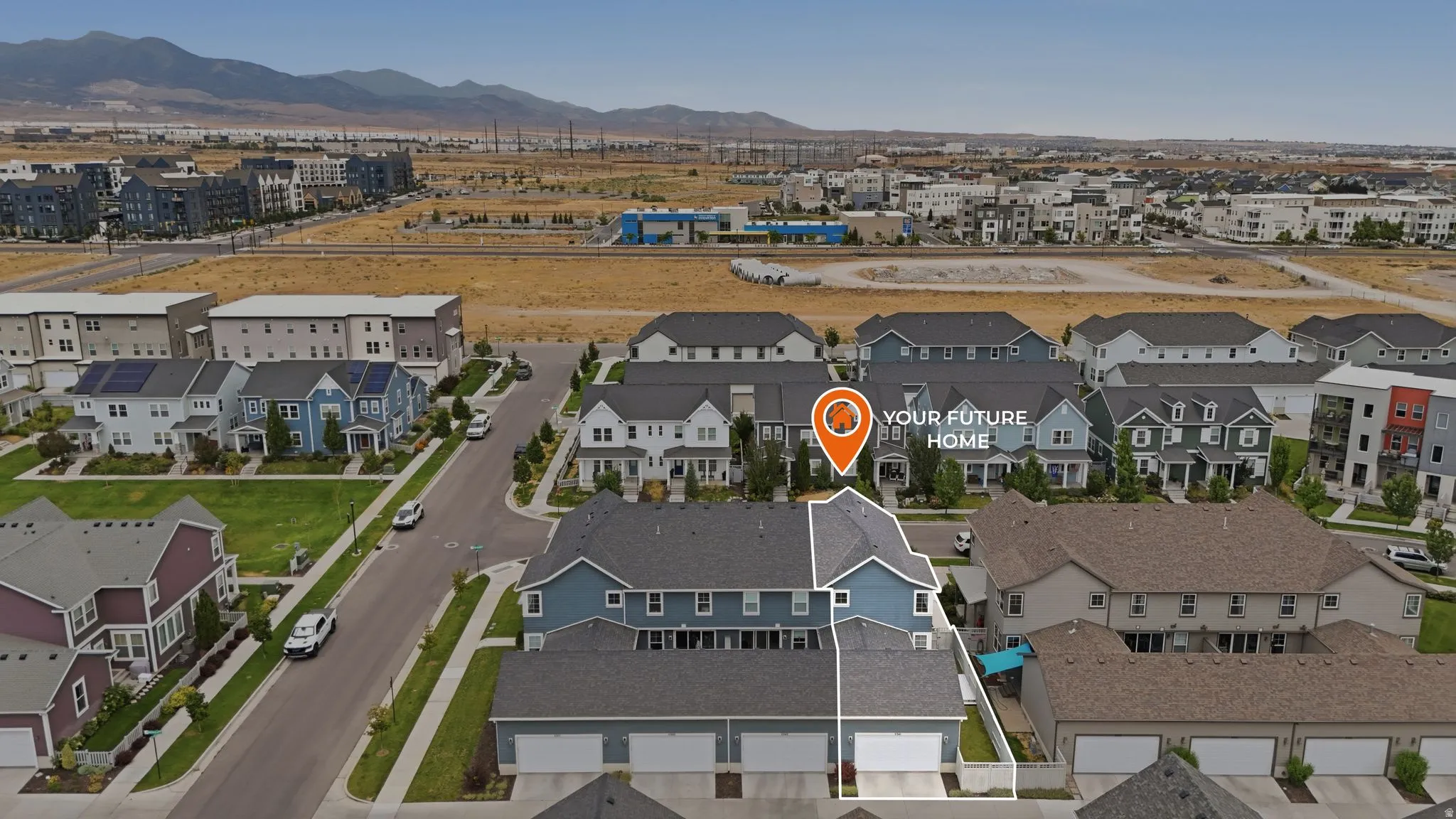 Aerial perspective showcasing a residential area with varied housing types