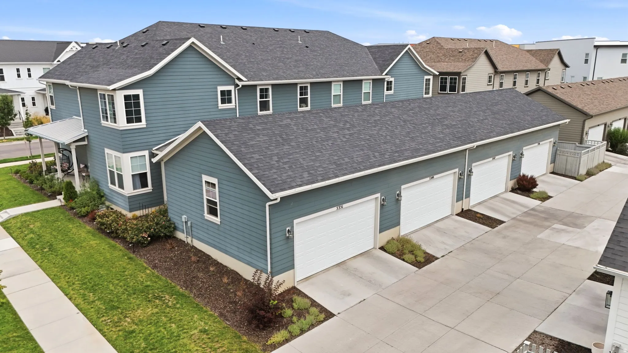 Two-story residence with blue siding and white trim