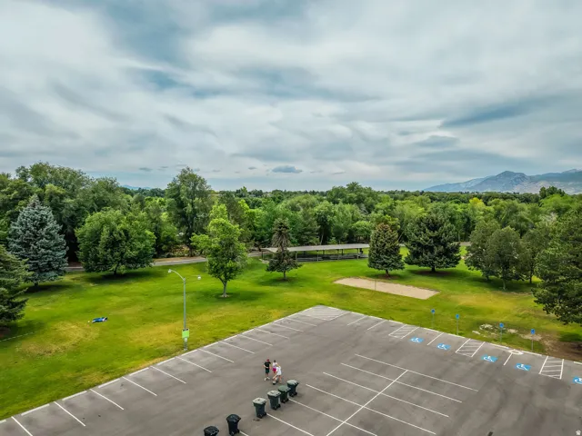 Expansive paved parking area with marked spaces and designated accessible parking