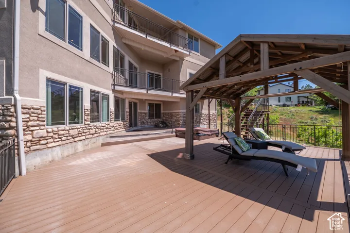 Third level walkout. Expansive multi-level composite deck featuring a built-in timber gazebo