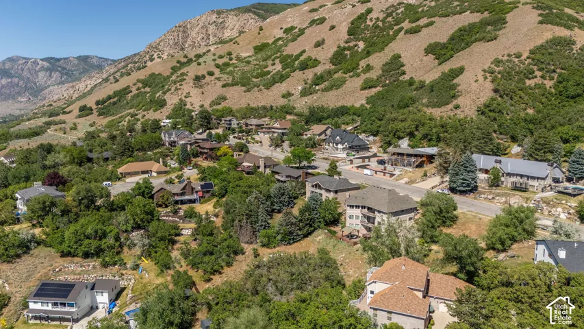 Mountainous landscape with residential properties nestled into the terrain