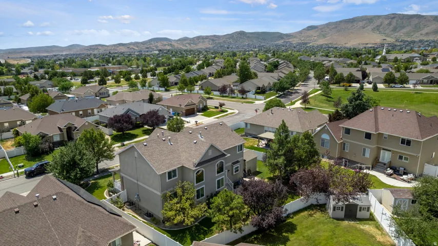 Aerial perspective highlighting a residential neighborhood with varied architectural styles