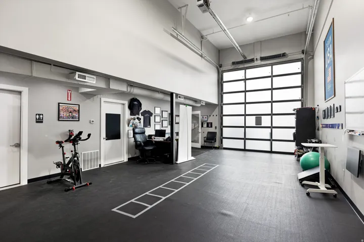 Spacious interior with high ceilings and rubber flooring