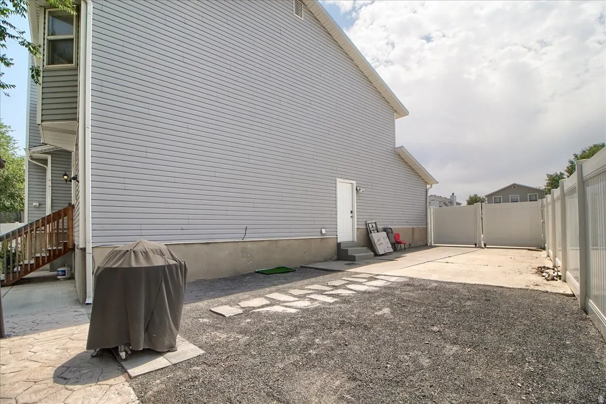 RV parking with double gate and side door into garage