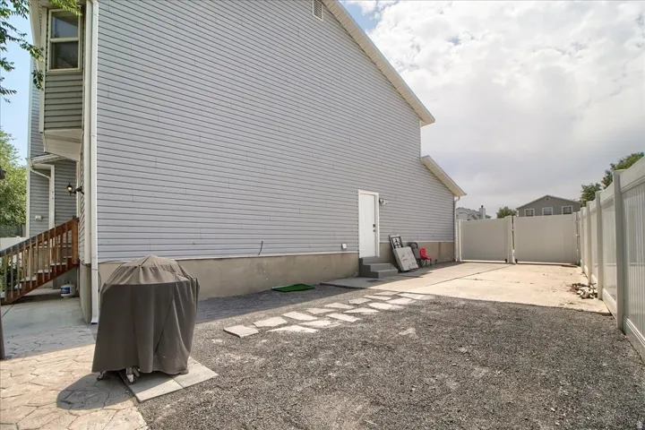 RV parking with double gate and side door into garage
