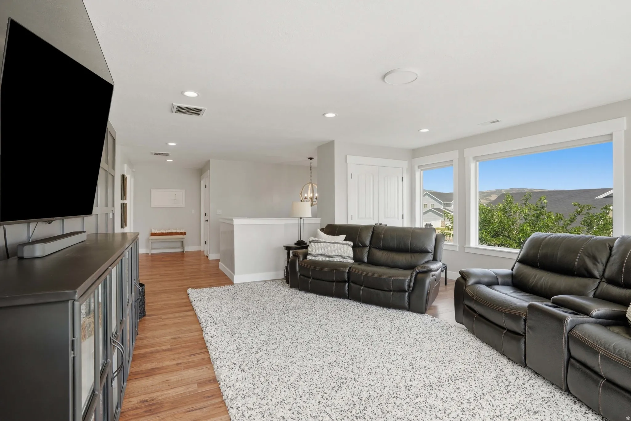 Second level living room with views