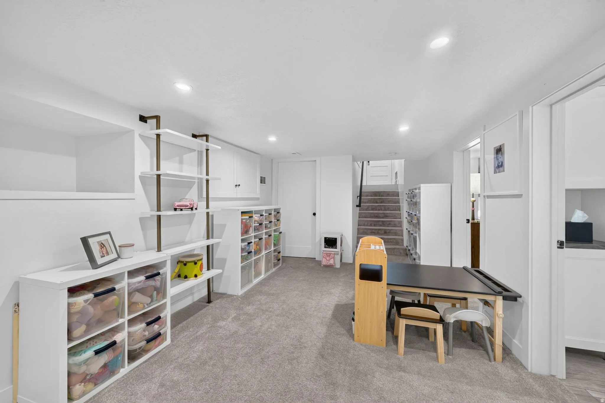 Versatile & large basement family room.  Recessed lighting, laundry room, and extra storage space.