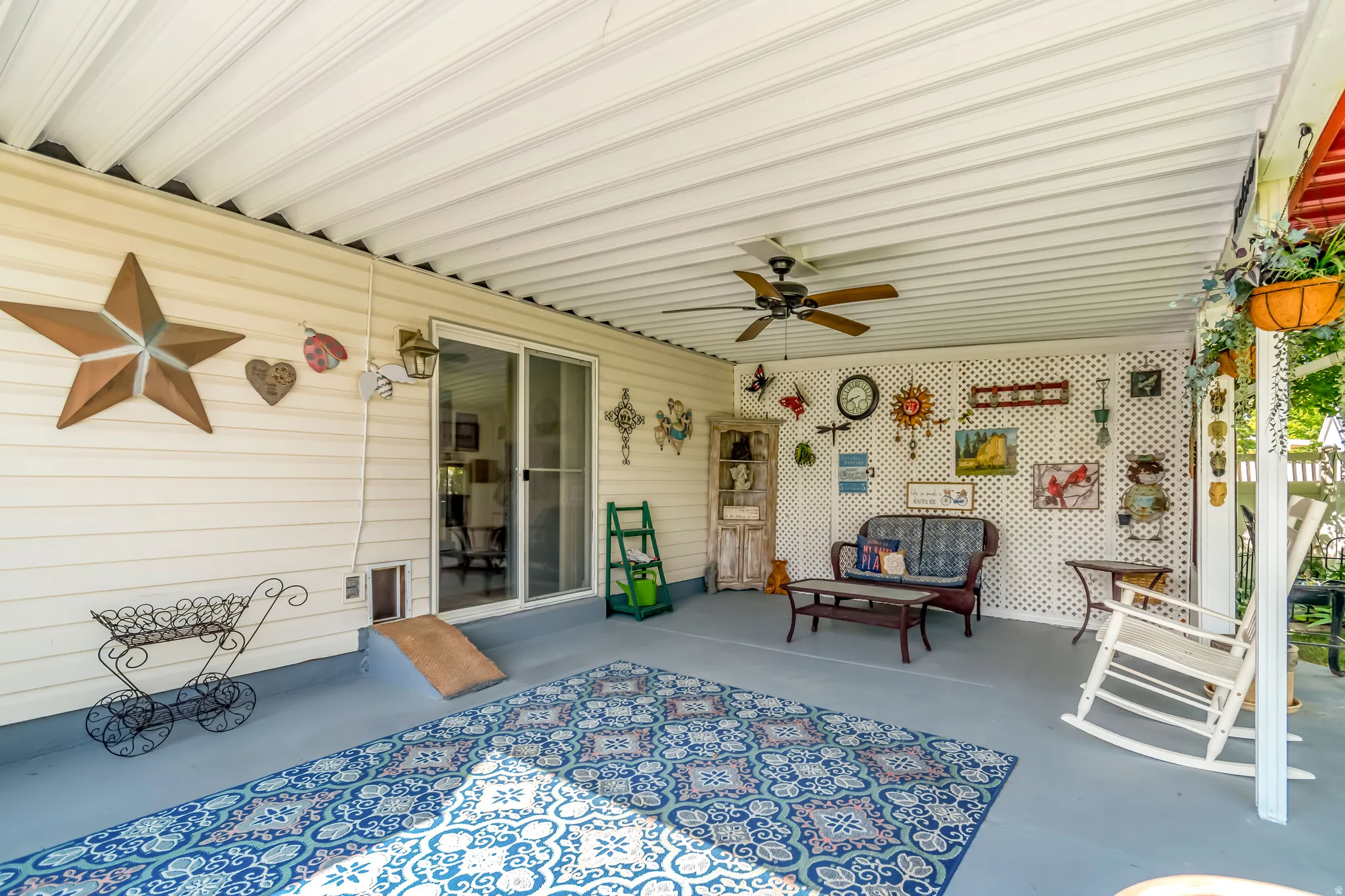 Covered patio with a painted concrete floor