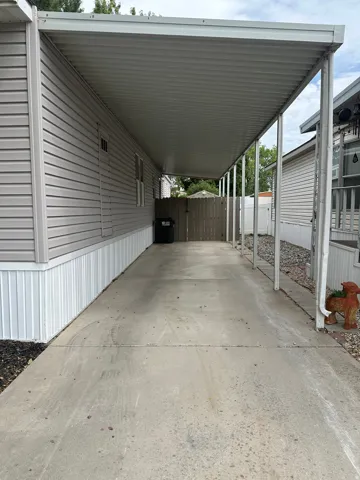 Extended carport providing covered parking